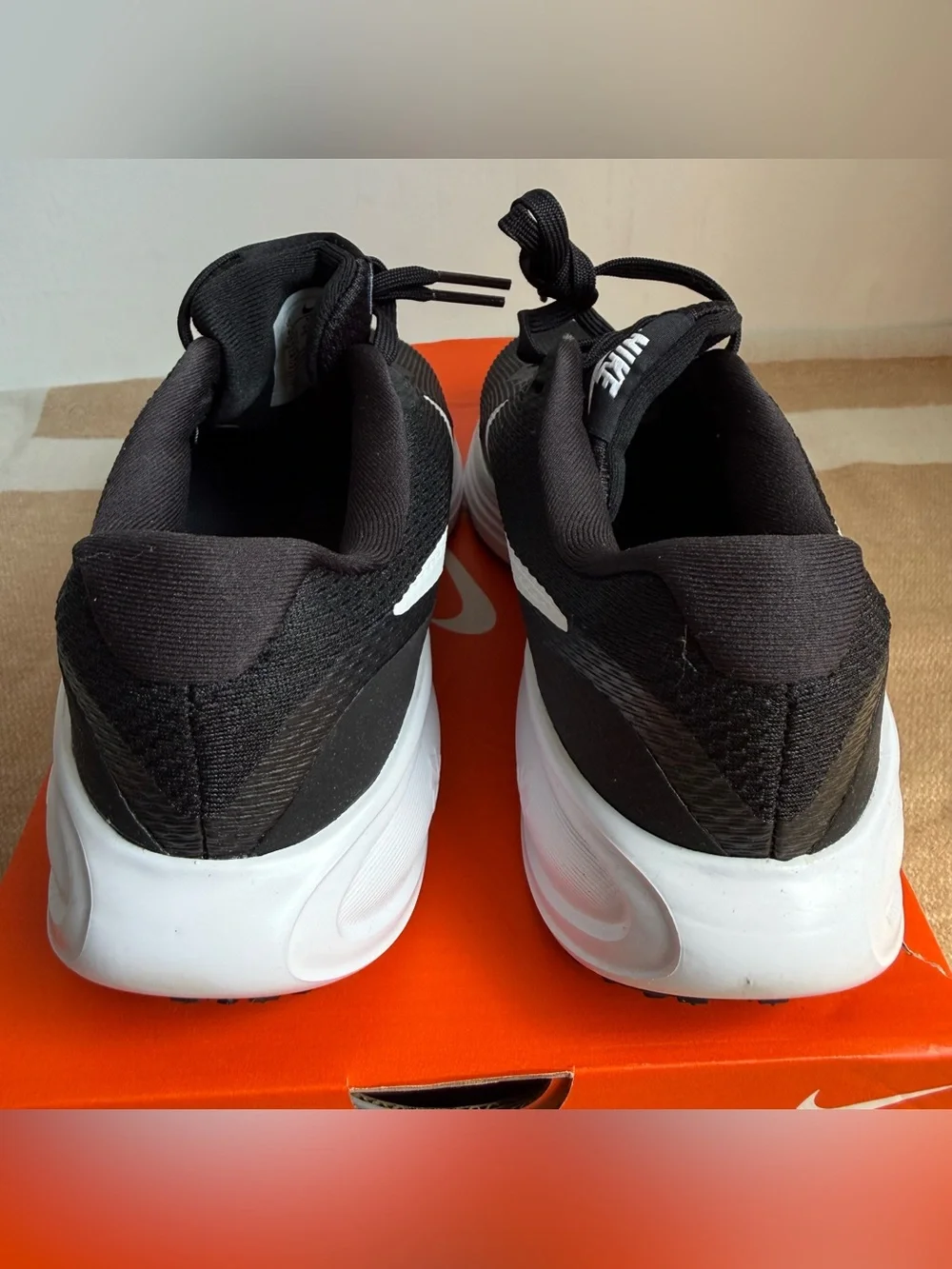 Size 6.5 US Women's- Nike Revolution 8 Black White.